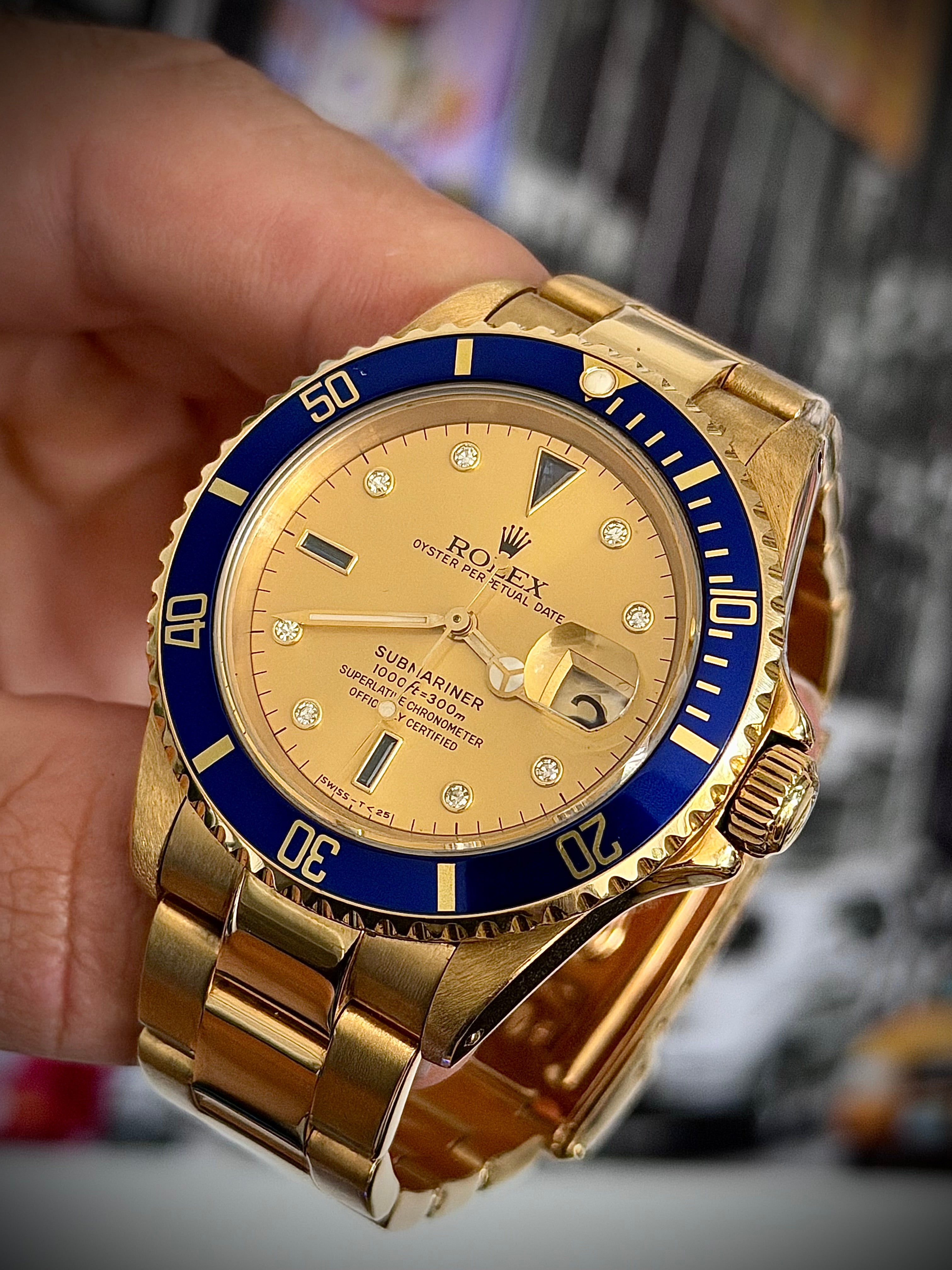 1988 ROLEX SUBMARINER, 16618, SULTAN DIAL, BOX AND BOOKLETS, INC GST