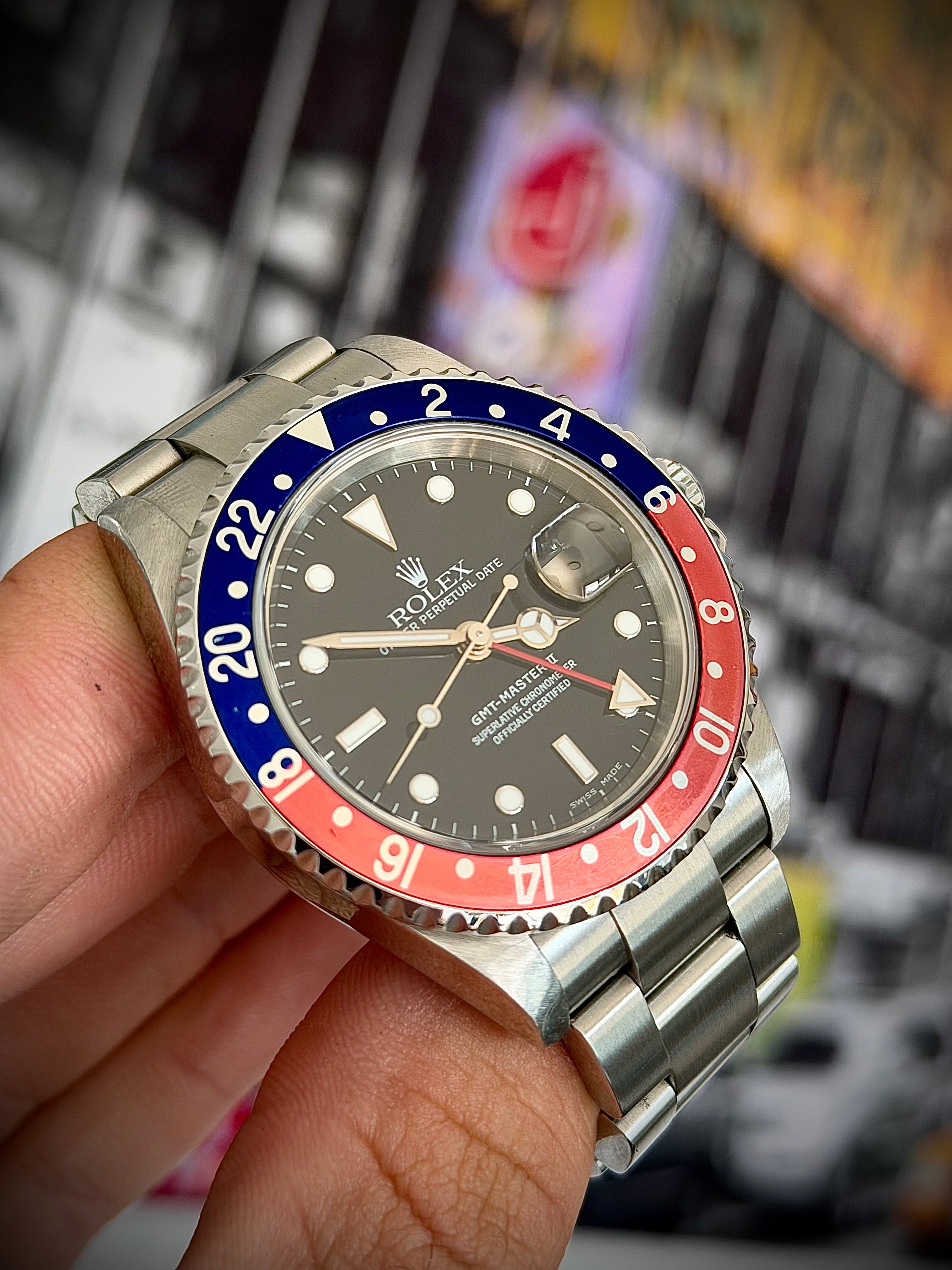 2004 ROLEX GMT-MASTER II, 16710 “PEPSI”, BOX, PAPERS AND ORIGINAL RECEIPT , INC GST