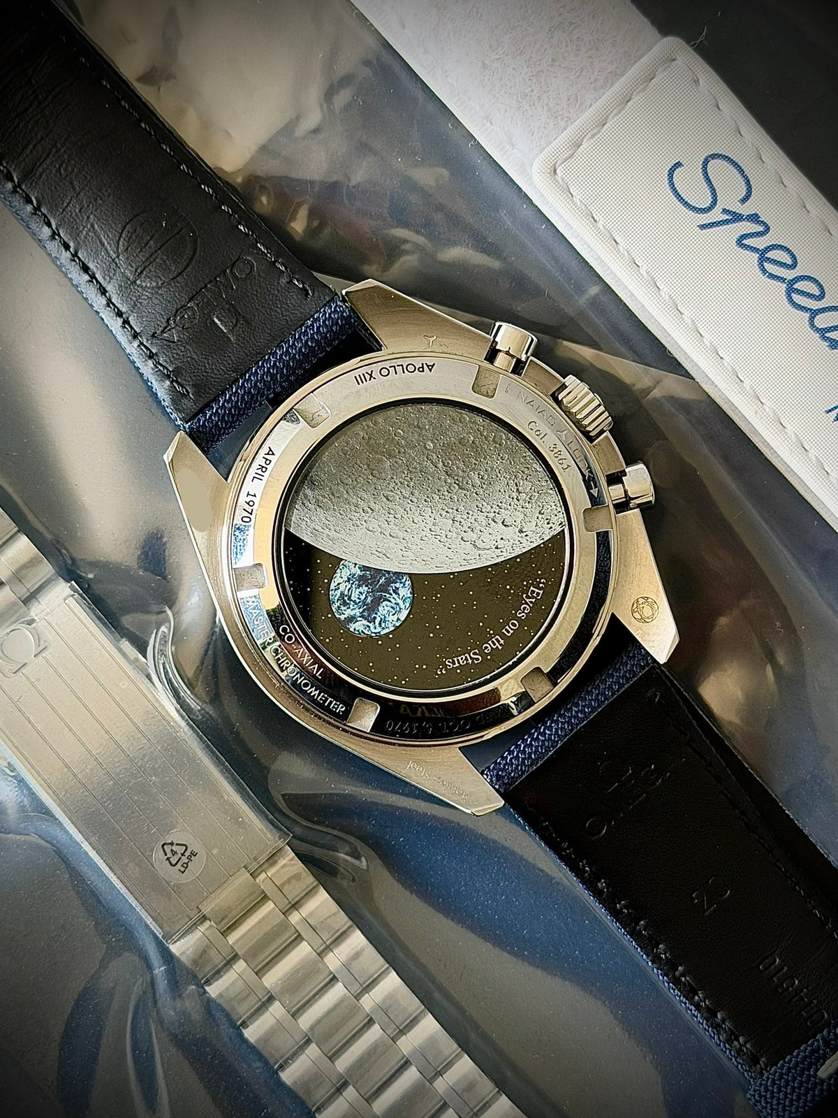 2023 OMEGA SPEEDMASTER “SILVER SNOOPY AWARD” 50TH ANNIVERSARY, 310.32.42.50.02.001, UNWORN SEALED BRACELET + WHITE STRAP, FULL SET, INC GST
