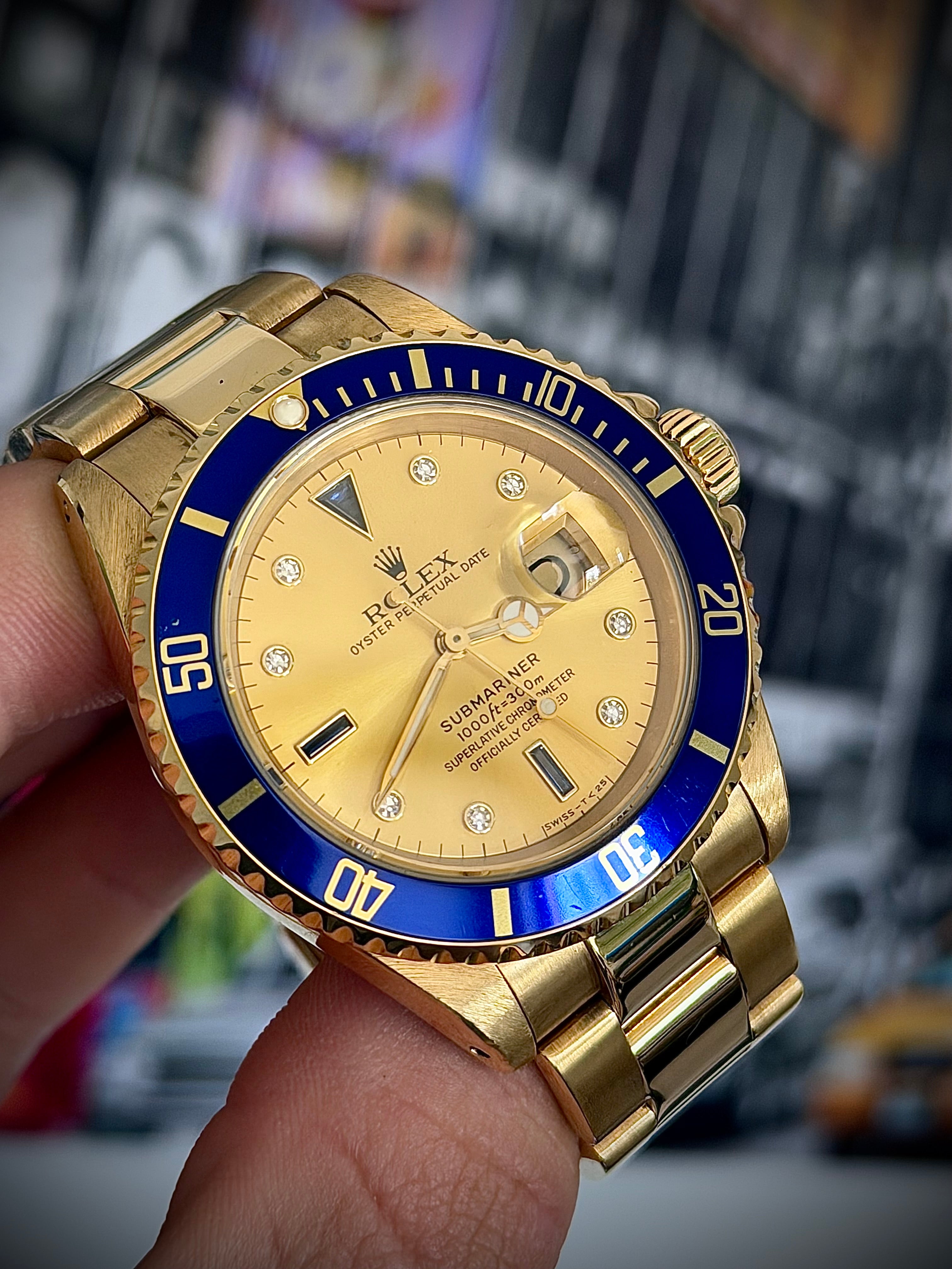 1988 ROLEX SUBMARINER, 16618, SULTAN DIAL, BOX AND BOOKLETS, INC GST