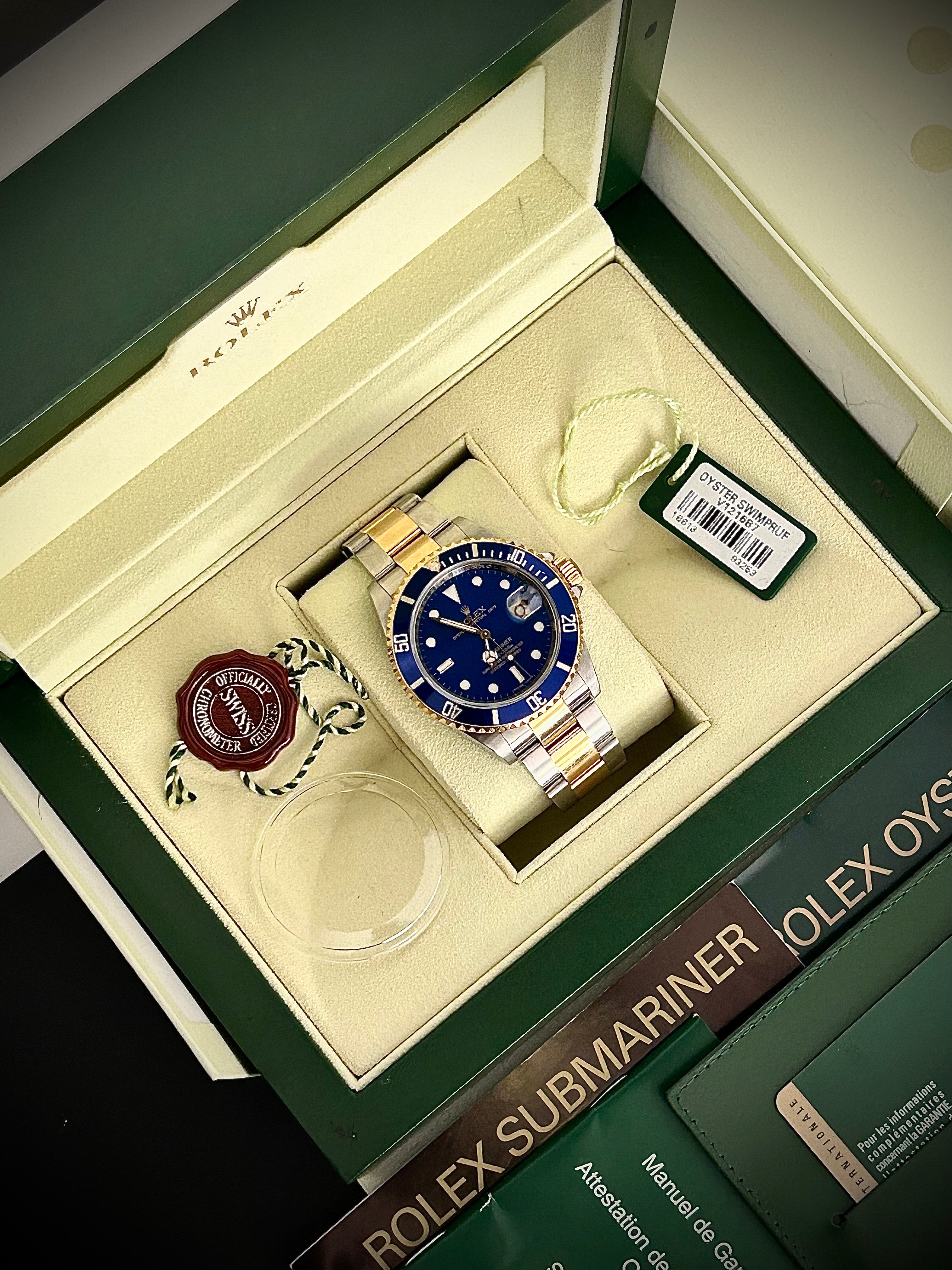 2008 ROLEX SUBMARINER DATE “BLUESY”, ENGRAVED REHAUT, NO HOLES, 16613LB, FULL SET, INC GST