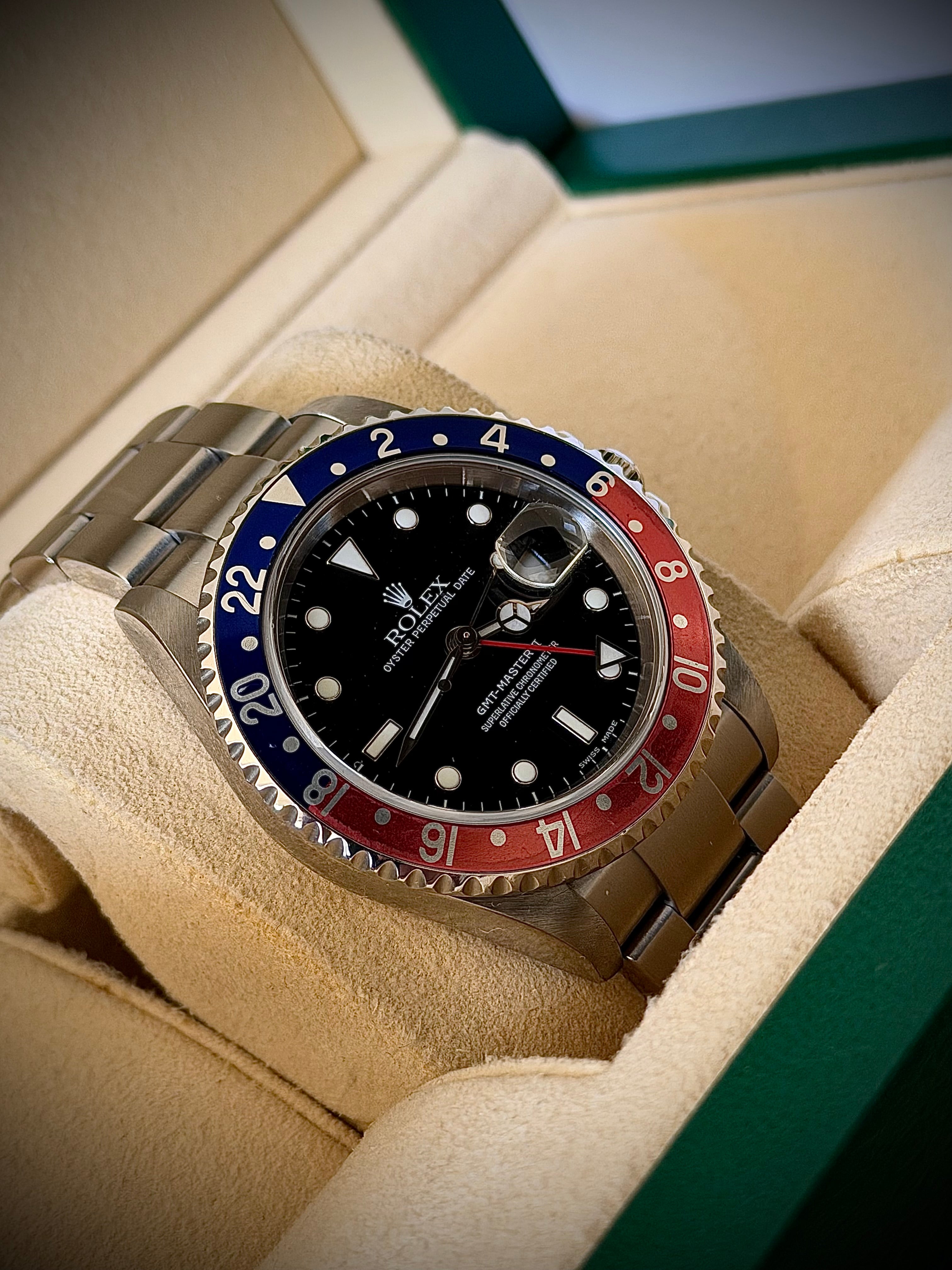 2004 ROLEX GMT-MASTER II, 16710 “PEPSI”, BOX, PAPERS AND ORIGINAL RECEIPT , INC GST