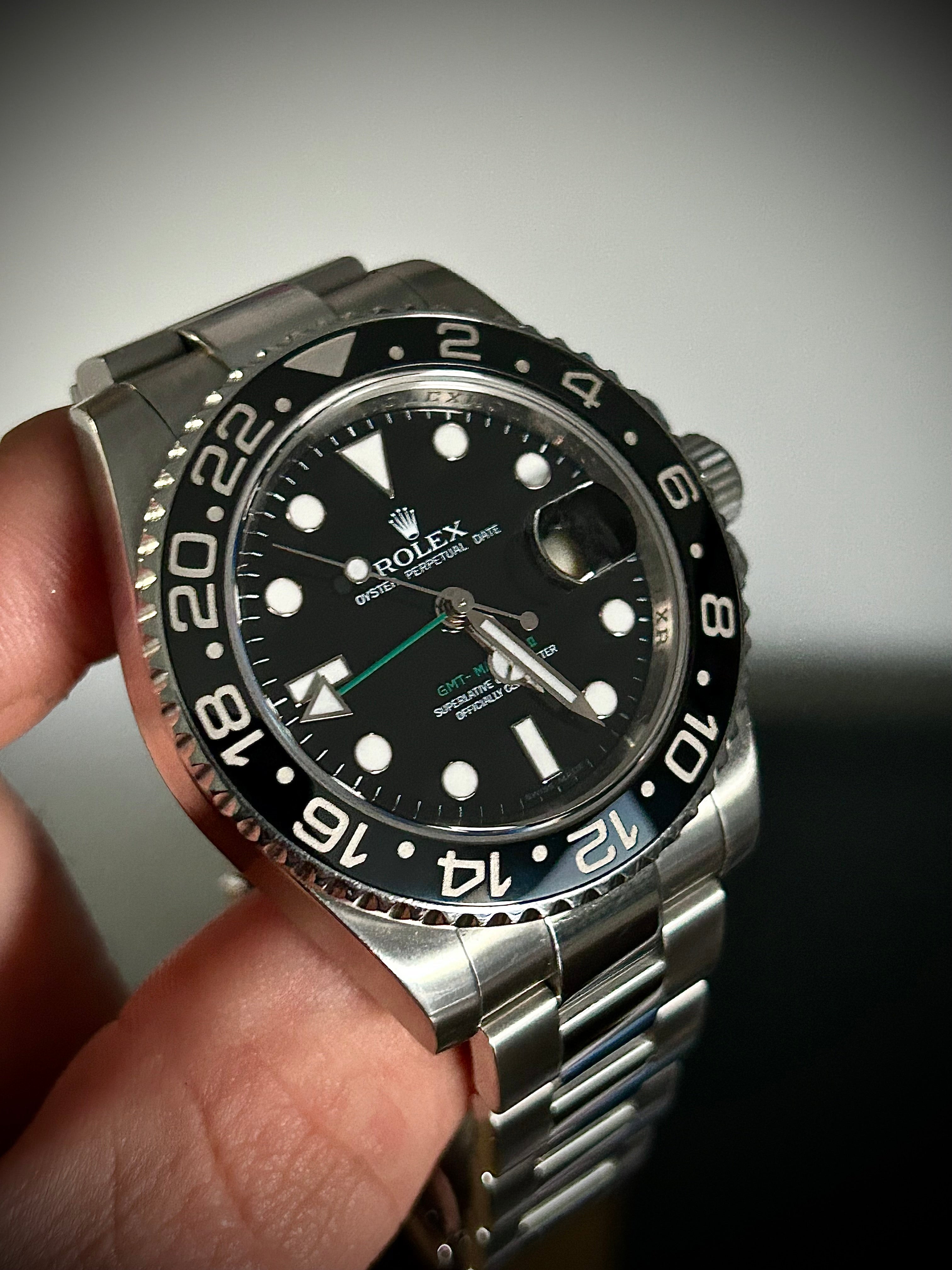 2007 ROLEX GMT MASTER II, 116710LN, BOX AND PAPERS, INC GST
