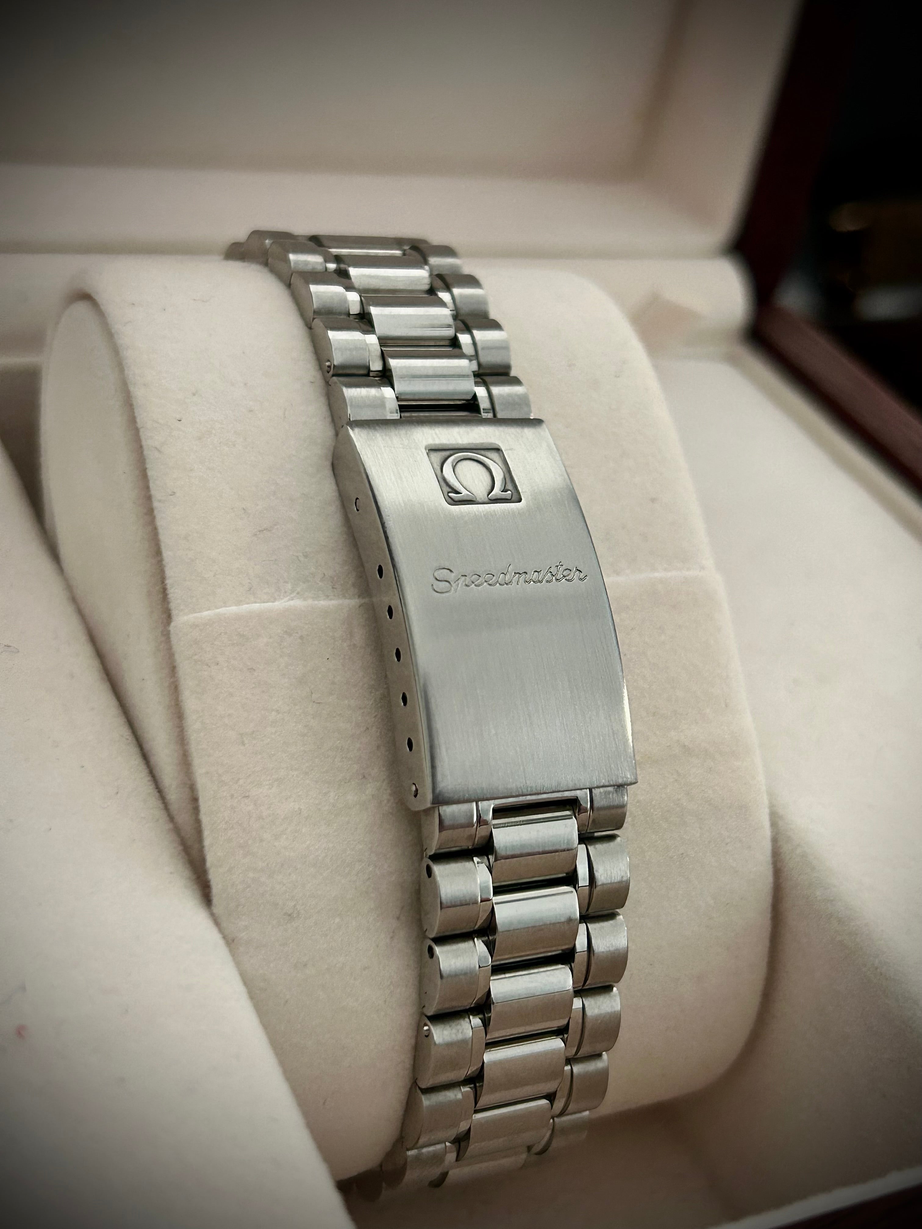 1996 OMEGA SPEEDMASTER REDUCED, WITH BOX, INC GST