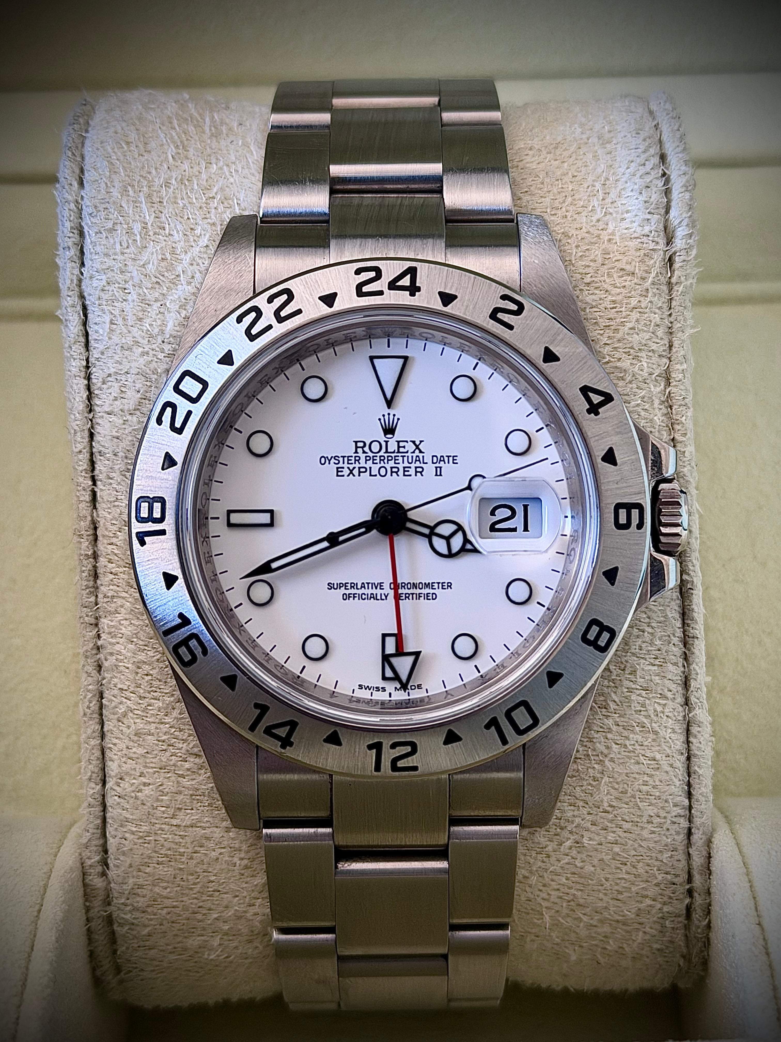 2011 ROLEX EXPLORER II, POLAR” 16570, NO HOLES SEL, ENGRAVED REHAUT, 3186 MOVEMENT, BOX BOOKLETS AND ORIGINAL RECEIPT, INC GST