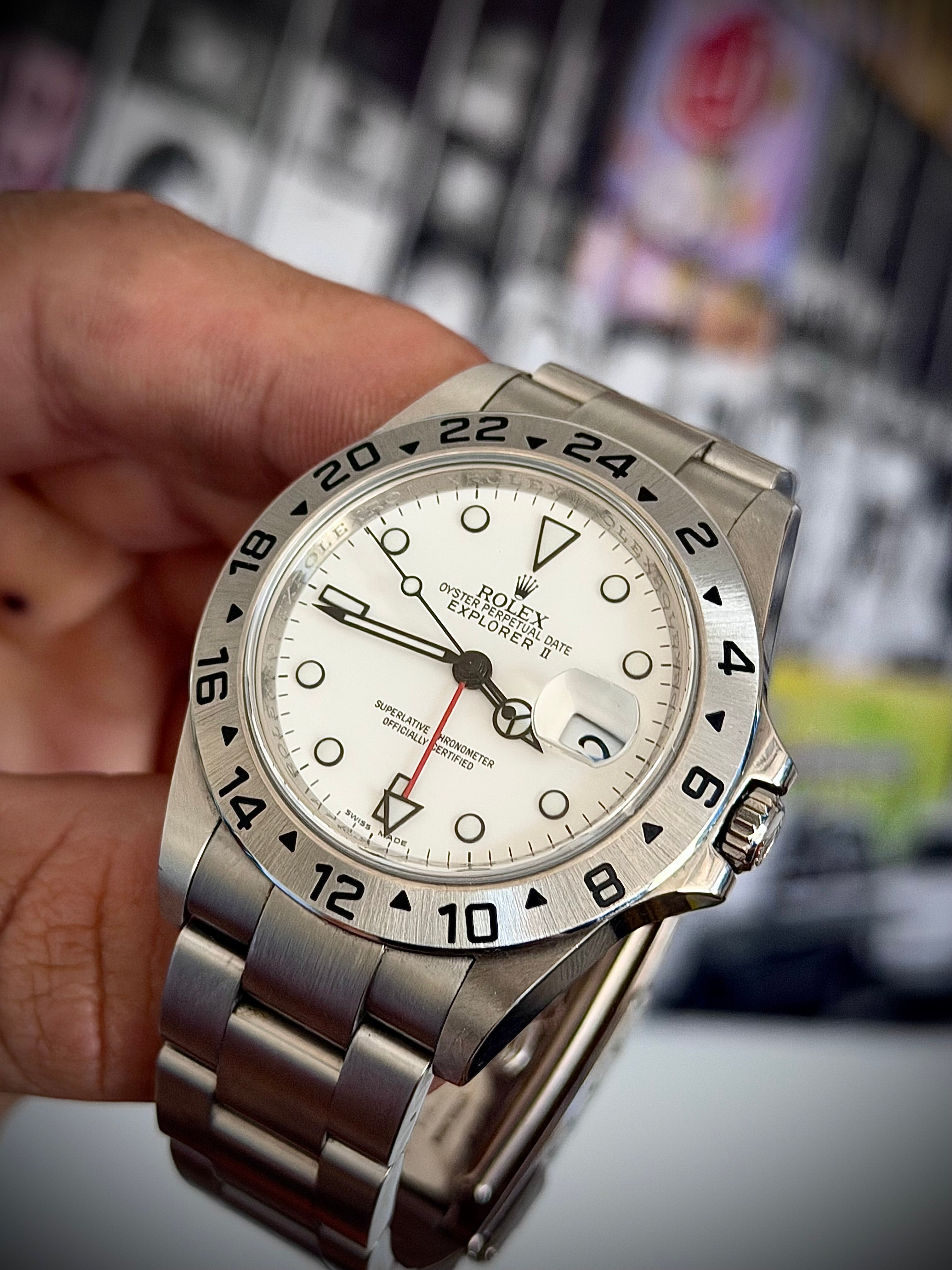 2011 ROLEX EXPLORER II, POLAR” 16570, NO HOLES SEL, ENGRAVED REHAUT, 3186 MOVEMENT, BOX BOOKLETS AND ORIGINAL RECEIPT, INC GST