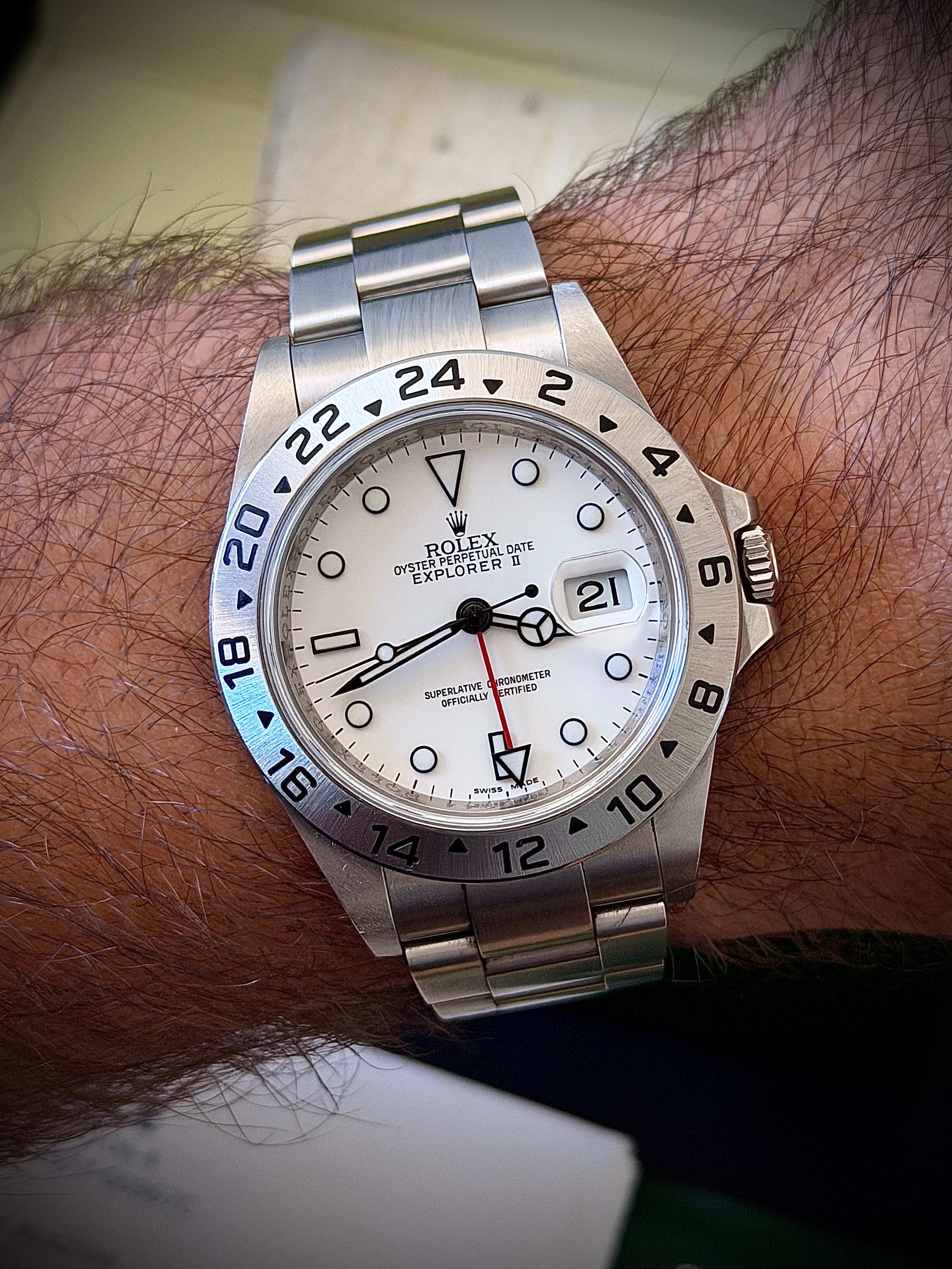 2011 ROLEX EXPLORER II, POLAR” 16570, NO HOLES SEL, ENGRAVED REHAUT, 3186 MOVEMENT, BOX BOOKLETS AND ORIGINAL RECEIPT, INC GST