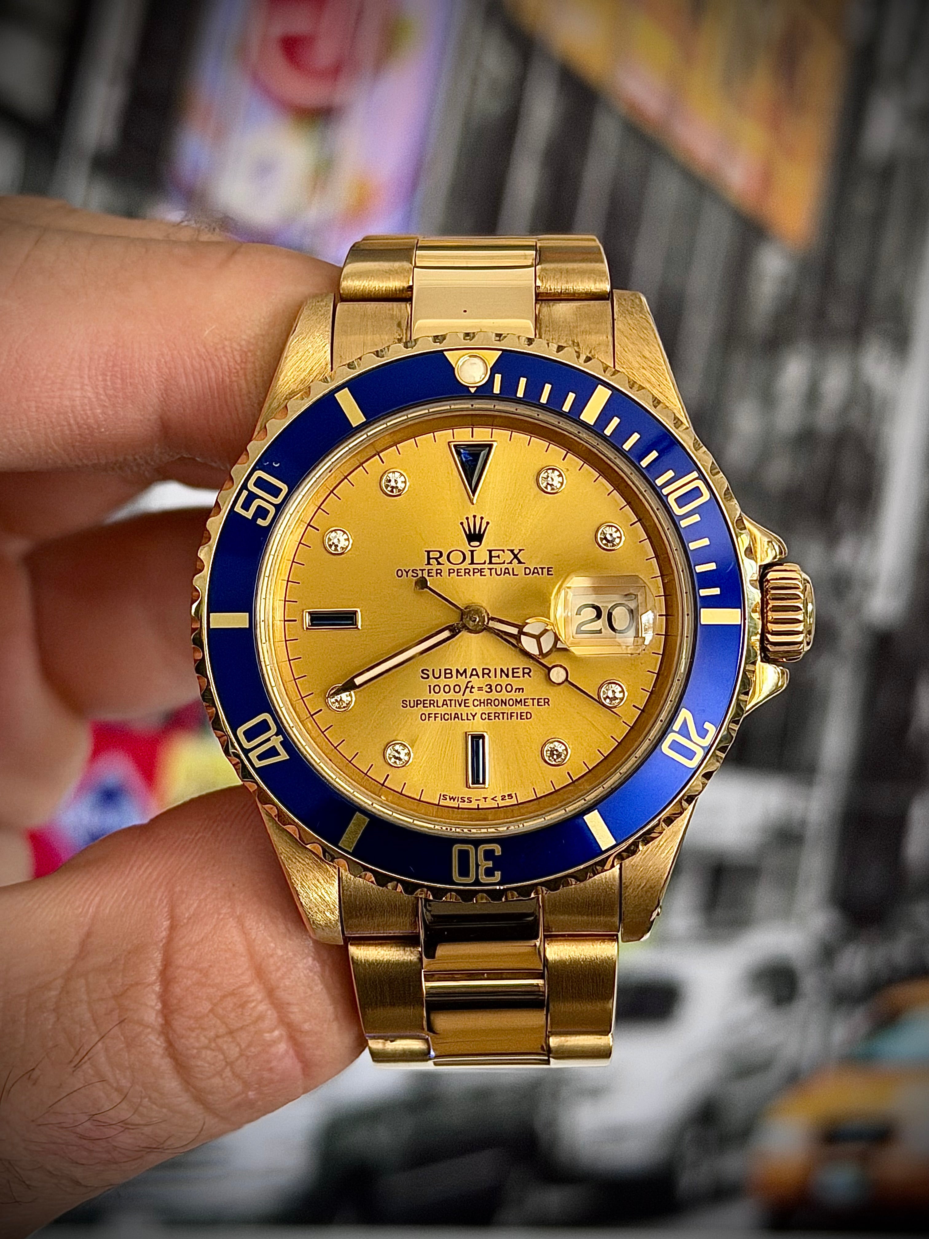 1988 ROLEX SUBMARINER, 16618, SULTAN DIAL, BOX AND BOOKLETS, INC GST