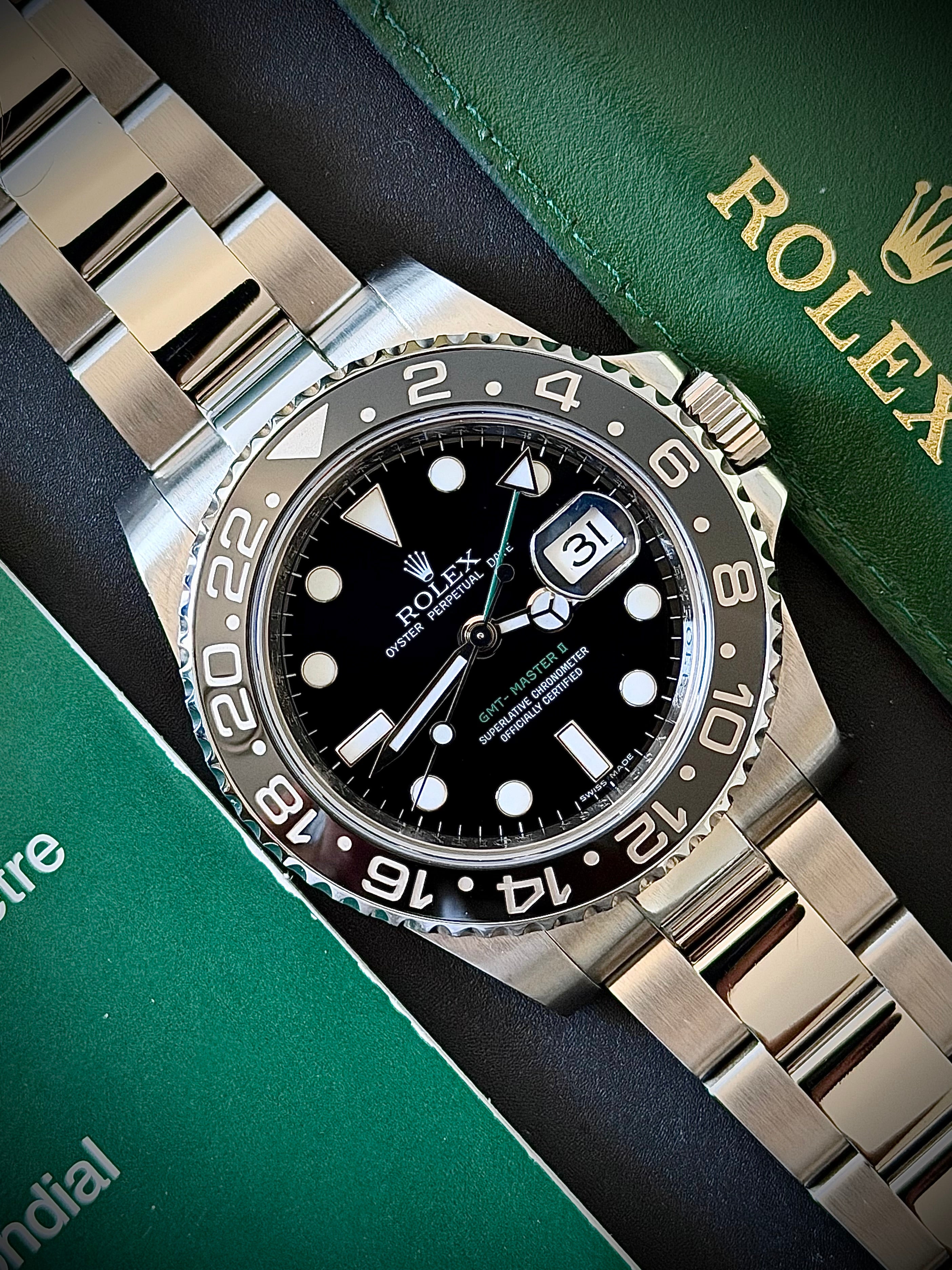 2010 ROLEX GMT MASTER II, 116710LN, BOX AND PAPERS, INC GST