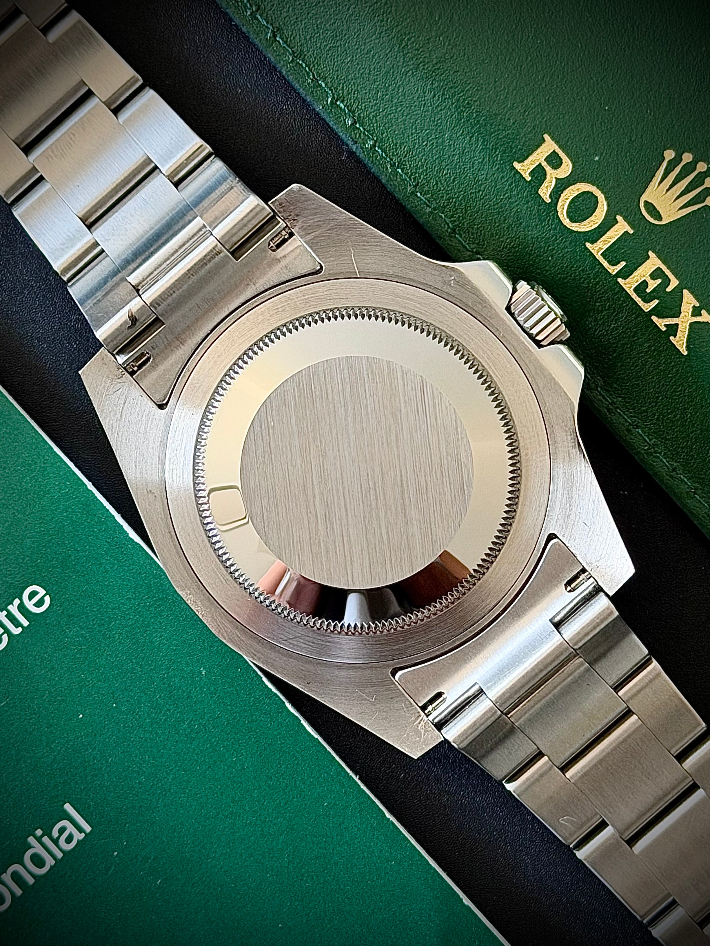 2010 ROLEX GMT MASTER II, 116710LN, BOX AND PAPERS, INC GST