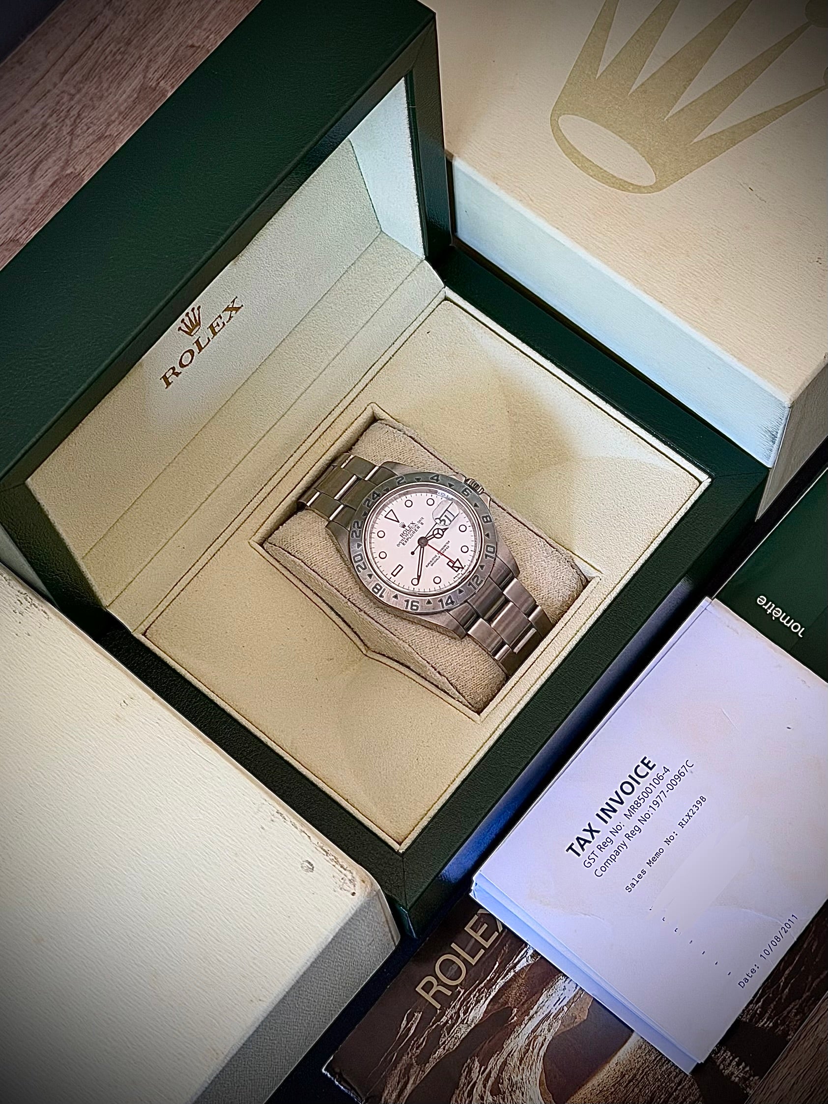 2011 ROLEX EXPLORER II, POLAR” 16570, NO HOLES SEL, ENGRAVED REHAUT, 3186 MOVEMENT, BOX BOOKLETS AND ORIGINAL RECEIPT, INC GST