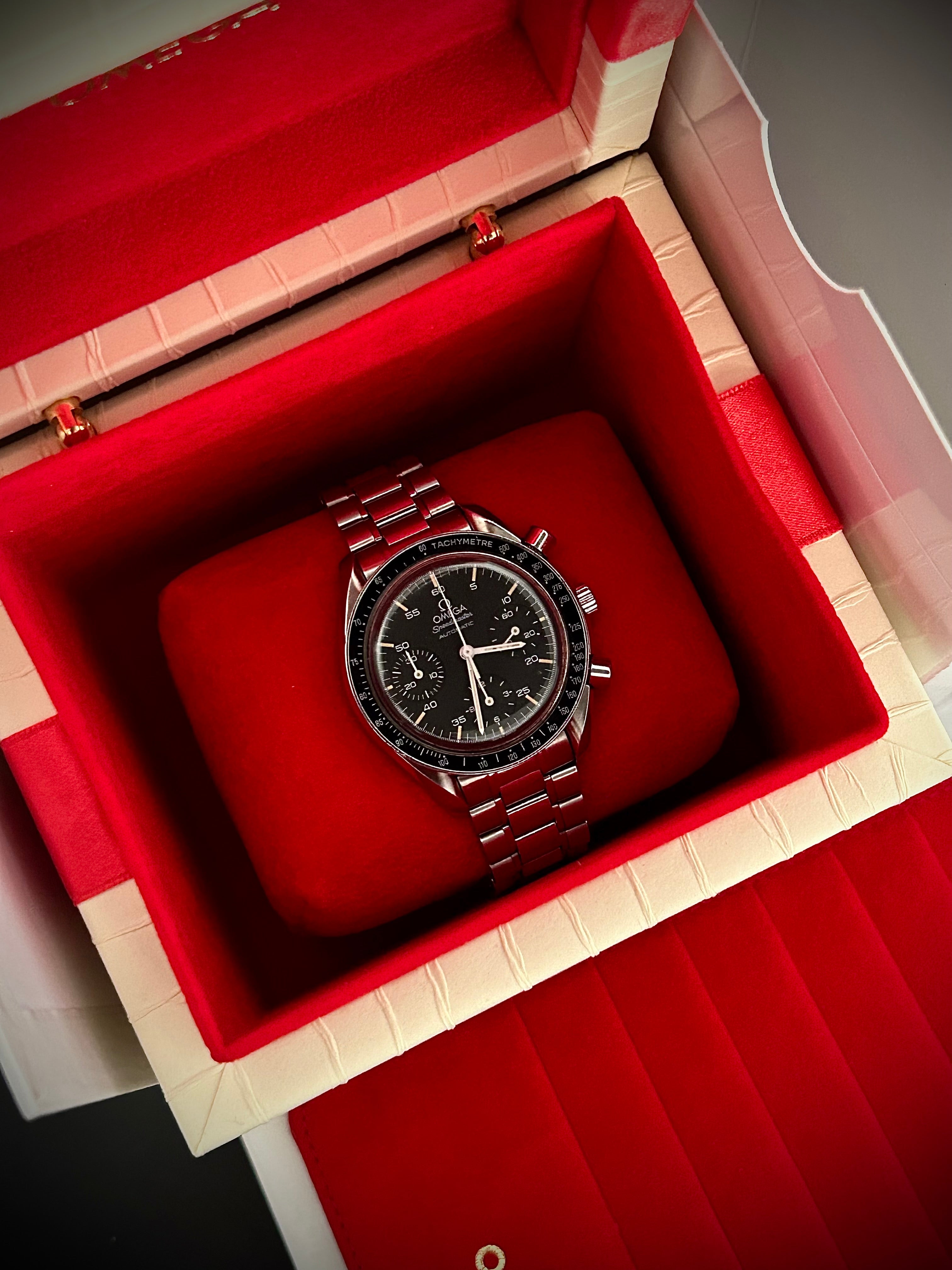 1996 OMEGA SPEEDMASTER REDUCED, WITH BOX, INC GST
