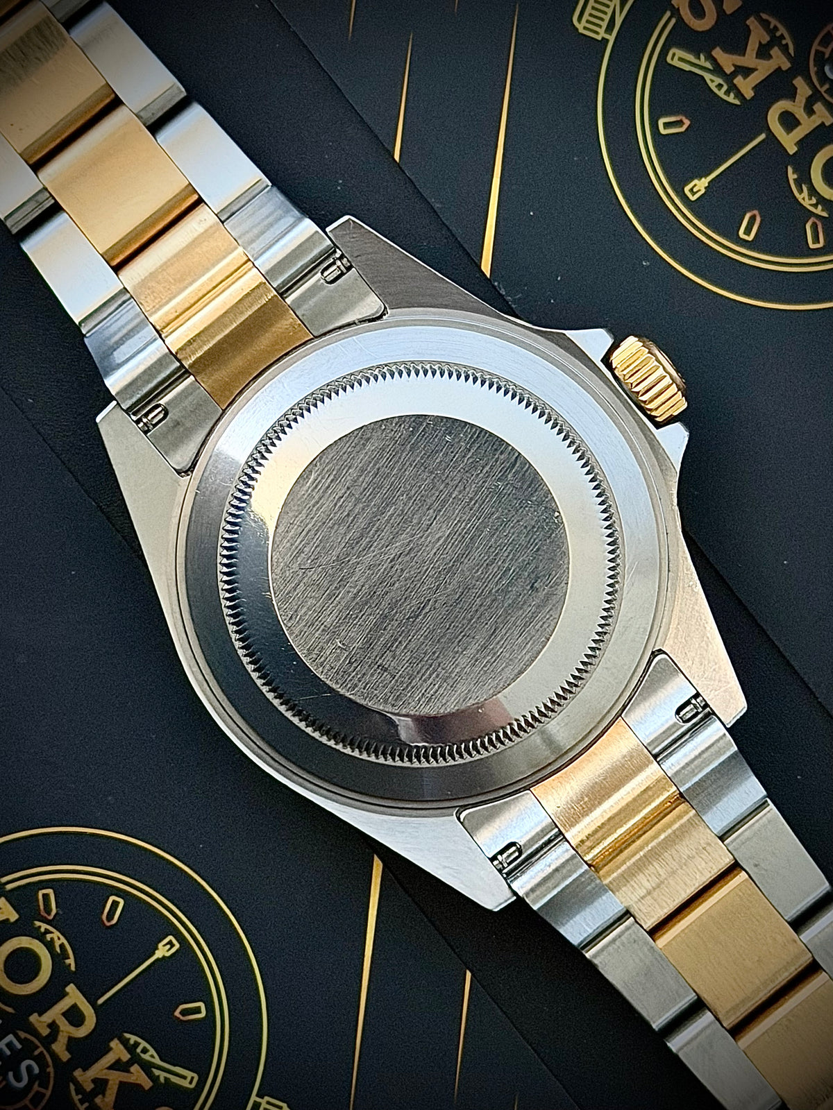 2009 ROLEX SUBMARINER DATE “BLUESY”, 16613LB, ENGRAVED REHAUT, NO HOLES CASE, SOLID END LINKS, WATCH ONLY, INC GST