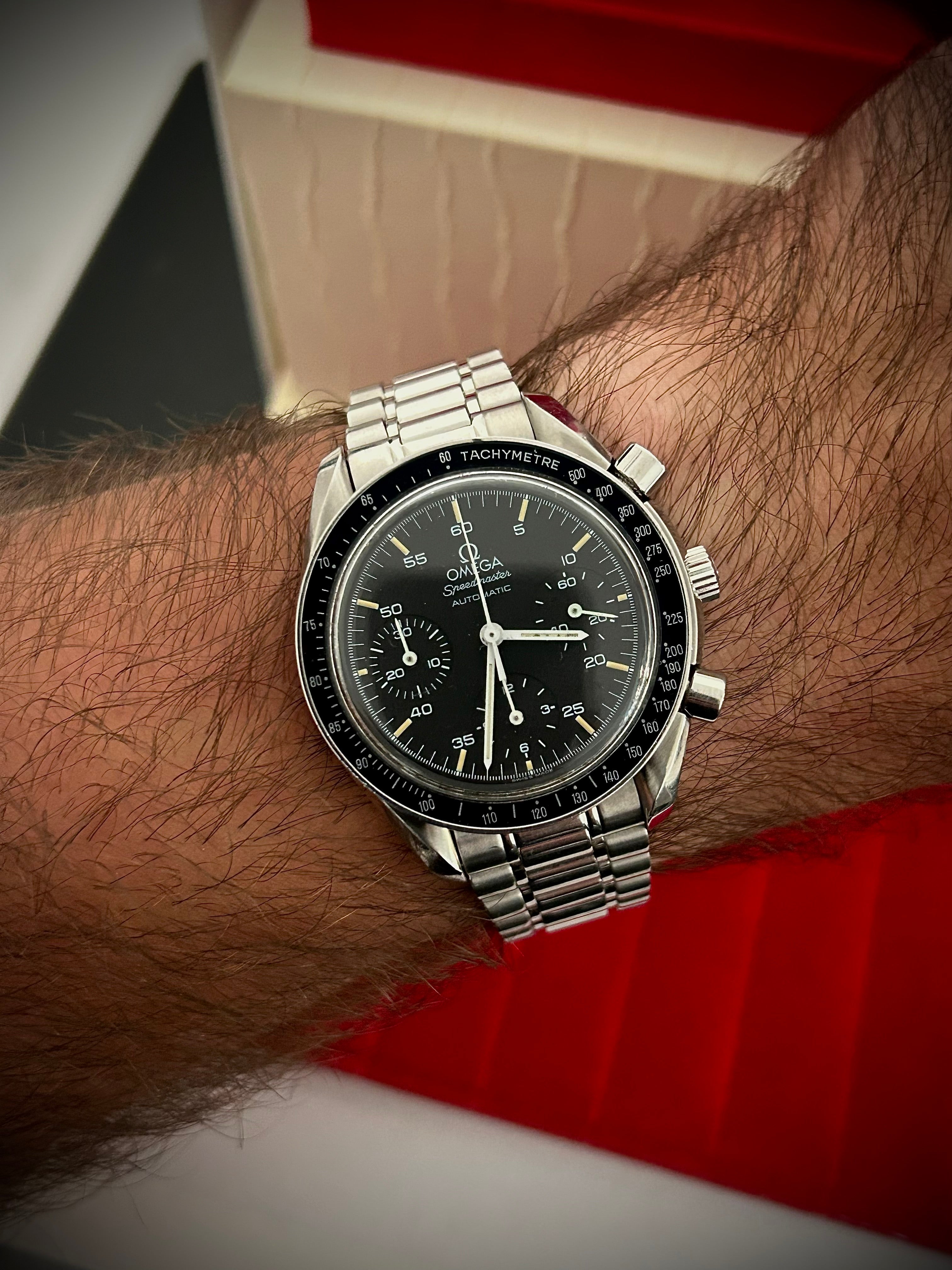 1996 OMEGA SPEEDMASTER REDUCED, WITH BOX, INC GST