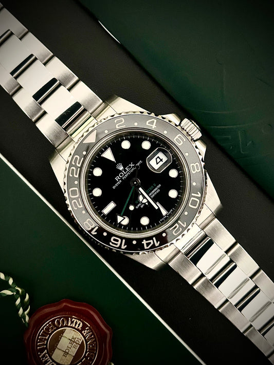 2009 ROLEX GMT MASTER II, BOX AND BOOKLETS, 116710LN, INC GST