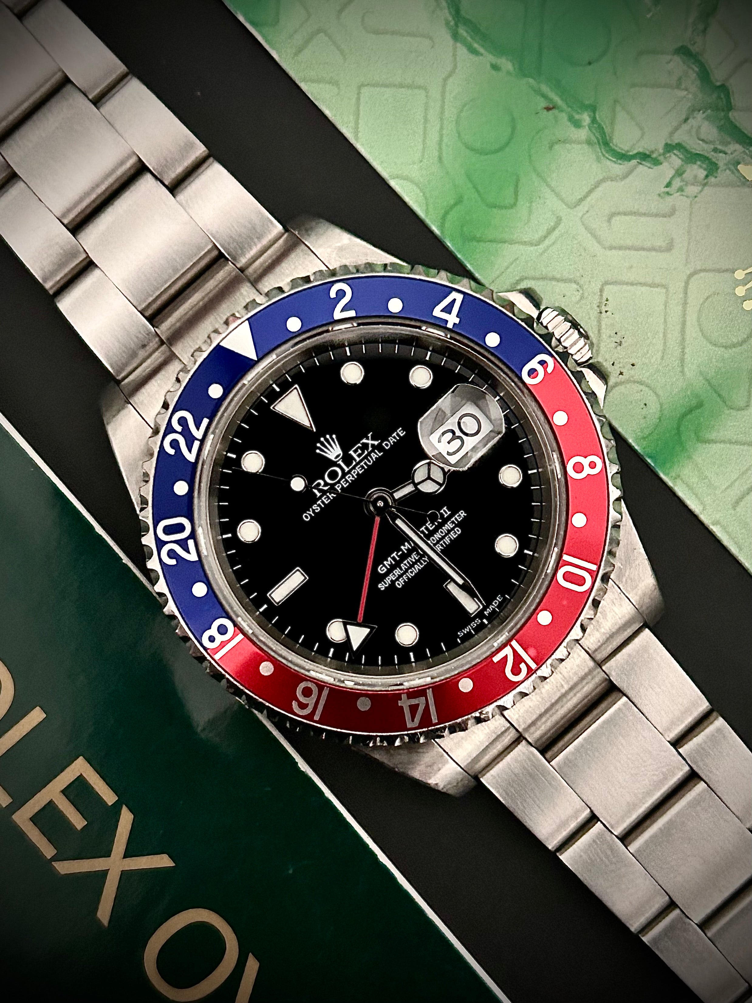 2002 ROLEX GMT MASTER II, PEPSI, 16710, BOX AND BOOKLETS, INC GST