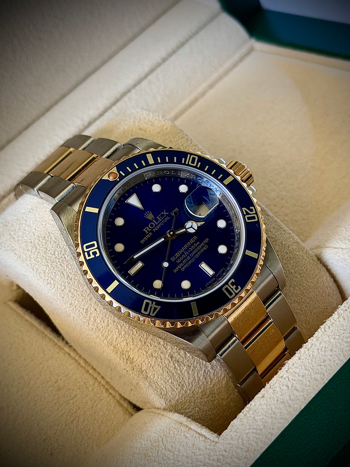 2009 ROLEX SUBMARINER DATE “BLUESY”, 16613LB, ENGRAVED REHAUT, NO HOLES CASE, SOLID END LINKS, WATCH ONLY, INC GST