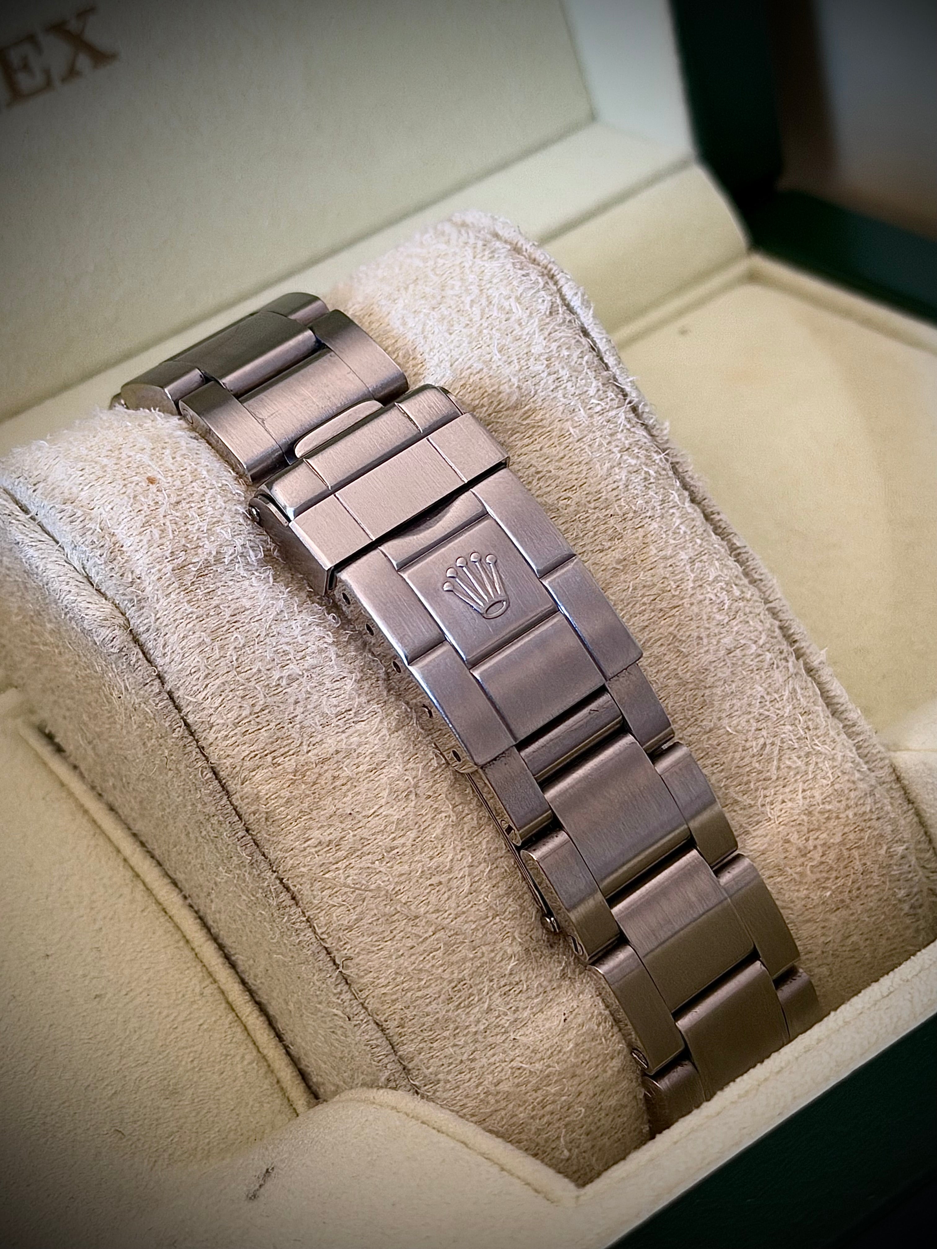 2011 ROLEX EXPLORER II, POLAR” 16570, NO HOLES SEL, ENGRAVED REHAUT, 3186 MOVEMENT, BOX BOOKLETS AND ORIGINAL RECEIPT, INC GST