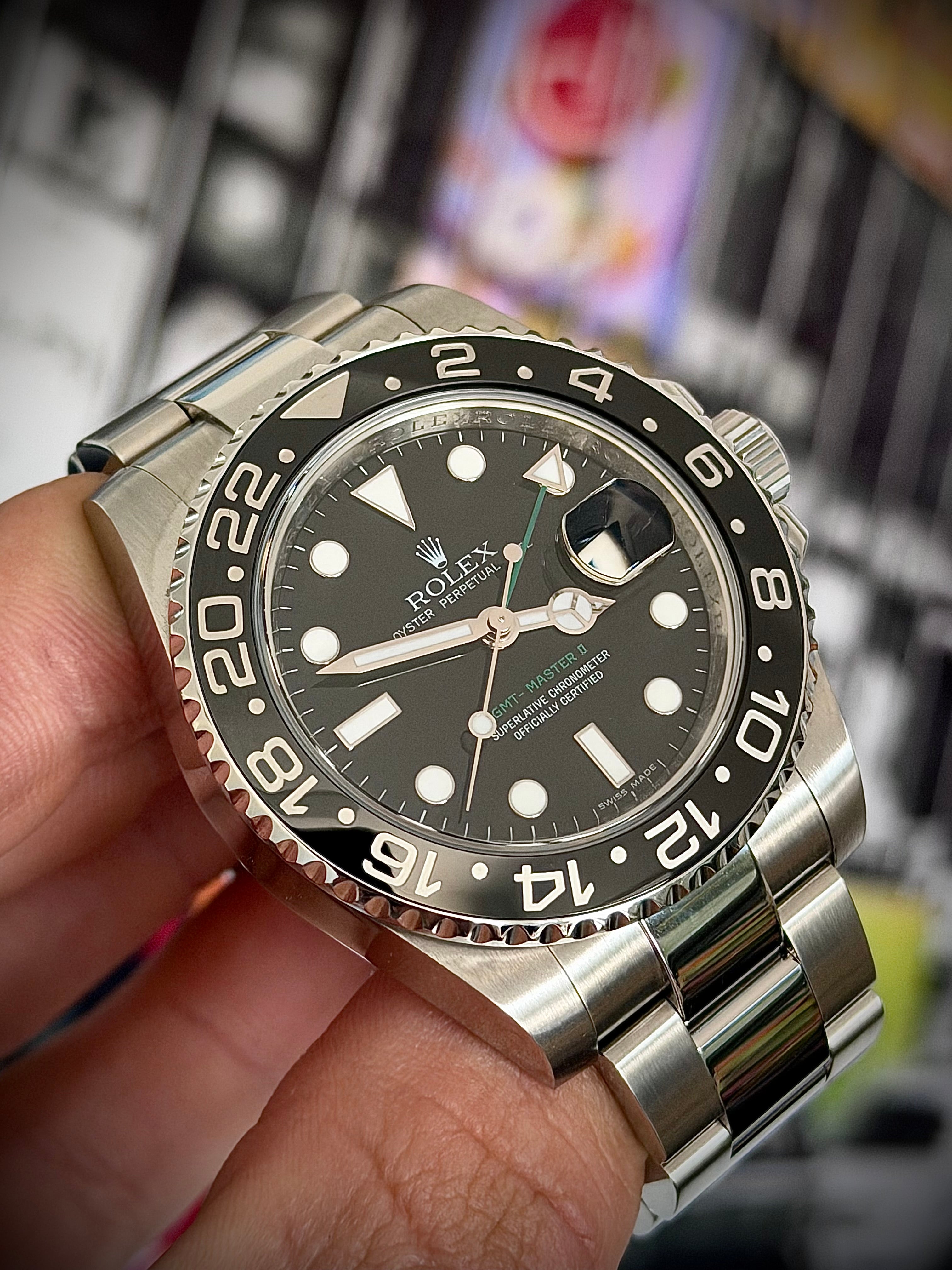 2010 ROLEX GMT MASTER II, 116710LN, BOX AND PAPERS, INC GST