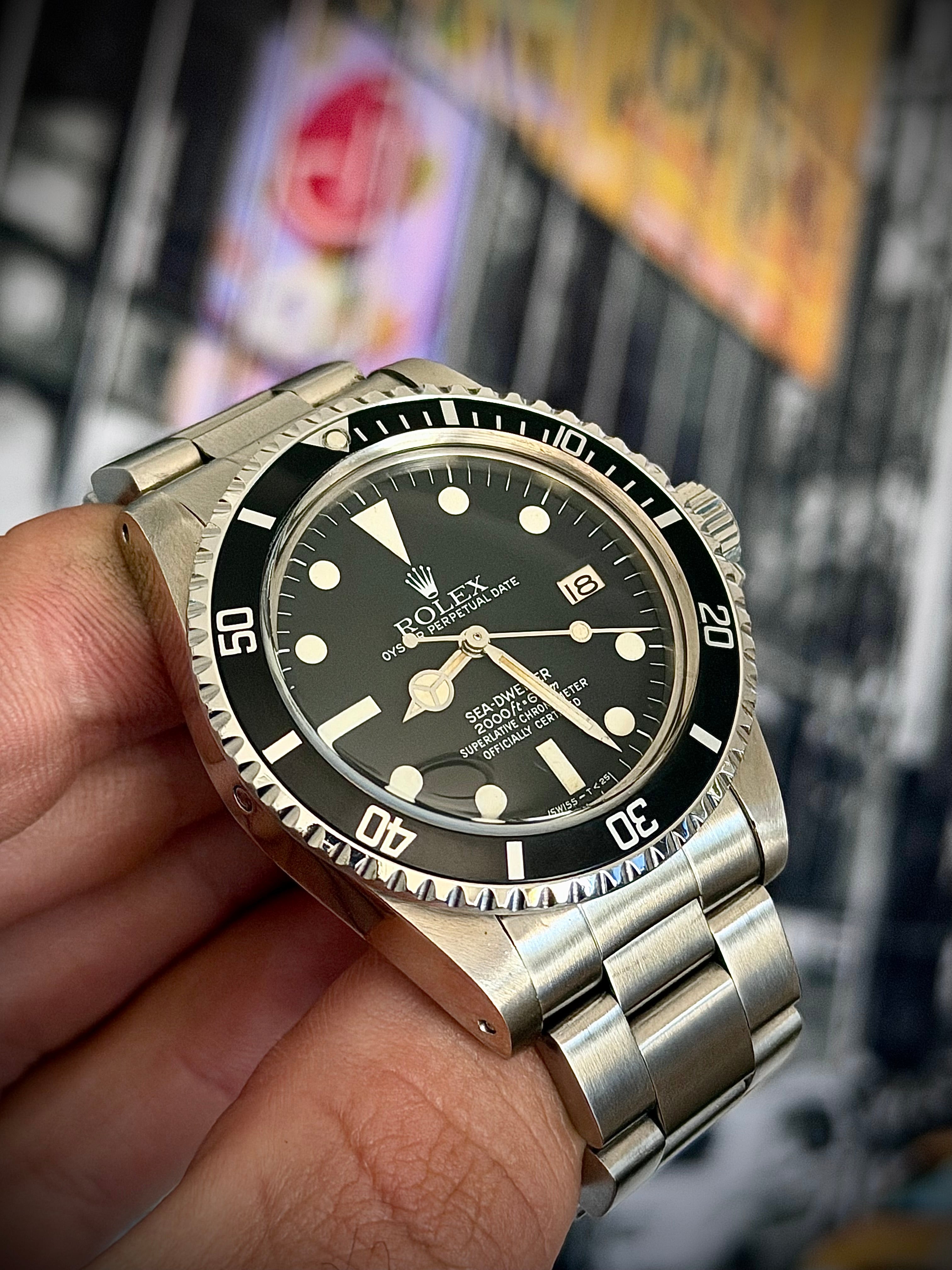 1981 ROLEX SEA-DWELLER 1665 “GREAT WHITE”, BOX AND PAPERS, INC GST