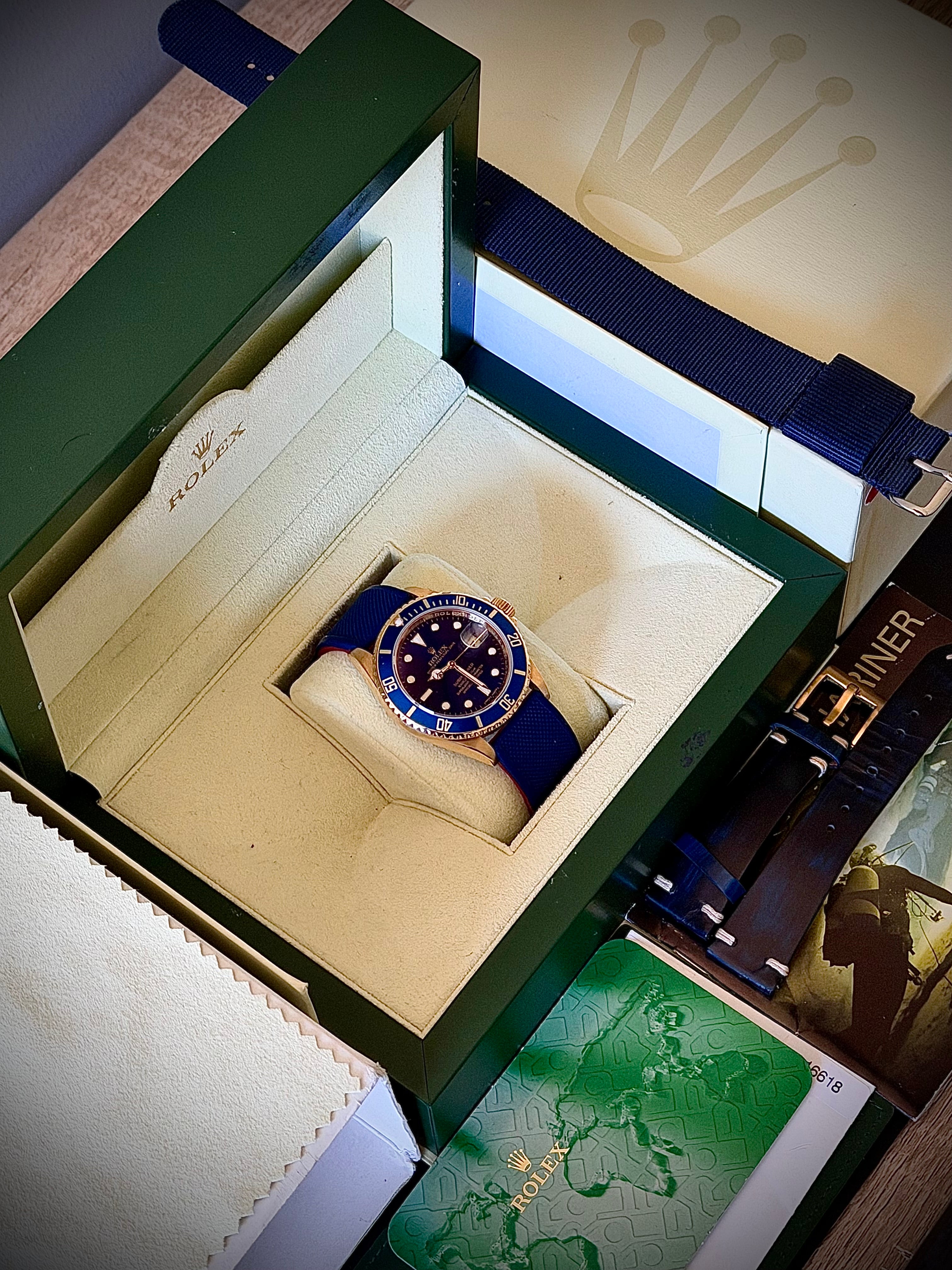 2007 ROLEX SUBMARINER DATE, 16618LB, ENGRAVED REHAUT, BOX AND PAPERS, INC GST