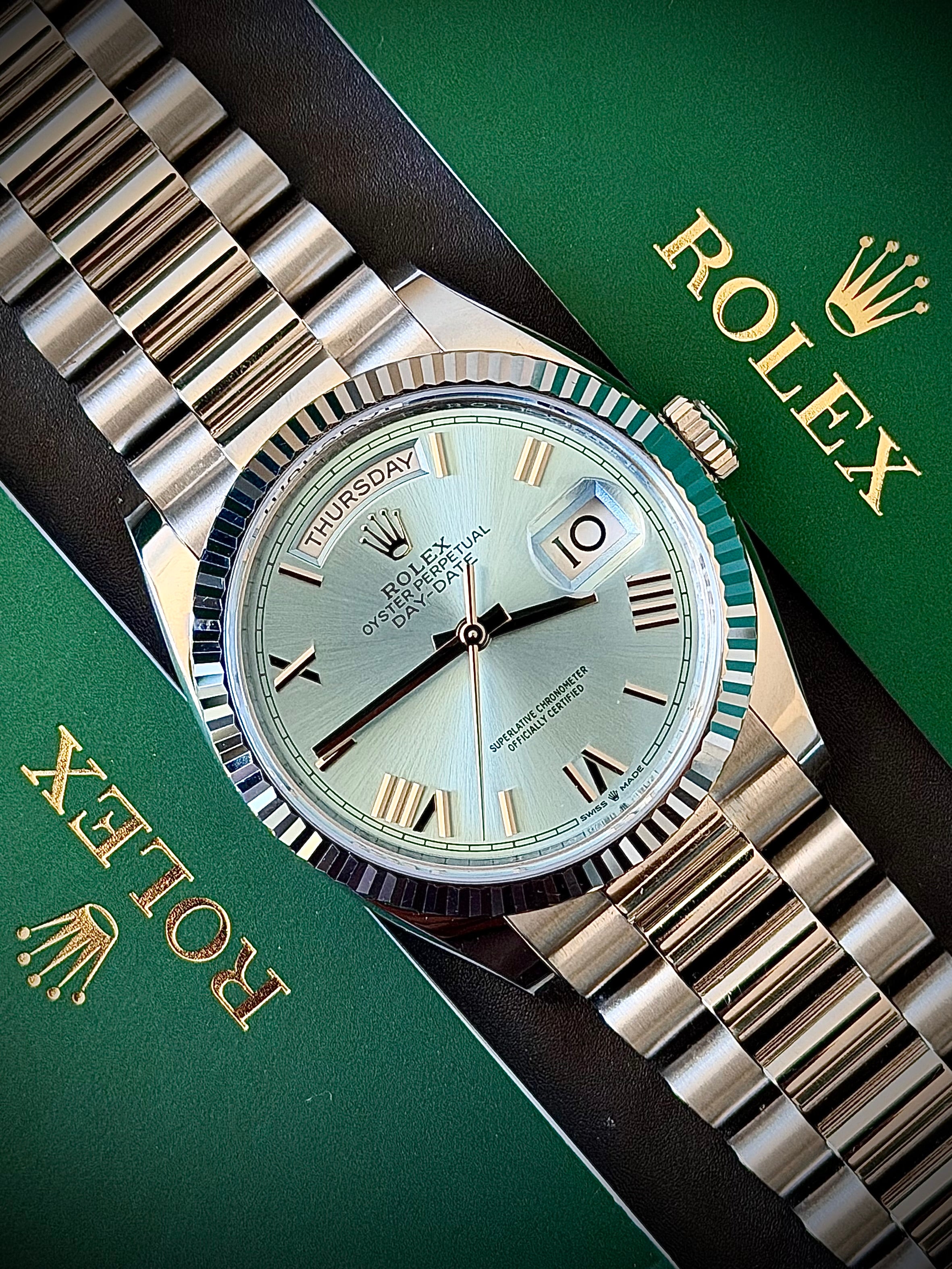 2025 ROLEX DAY-DATE 36 PLATINUM, ICE BLUE ROMAN DIAL, 128236, FULL SET, INC GST