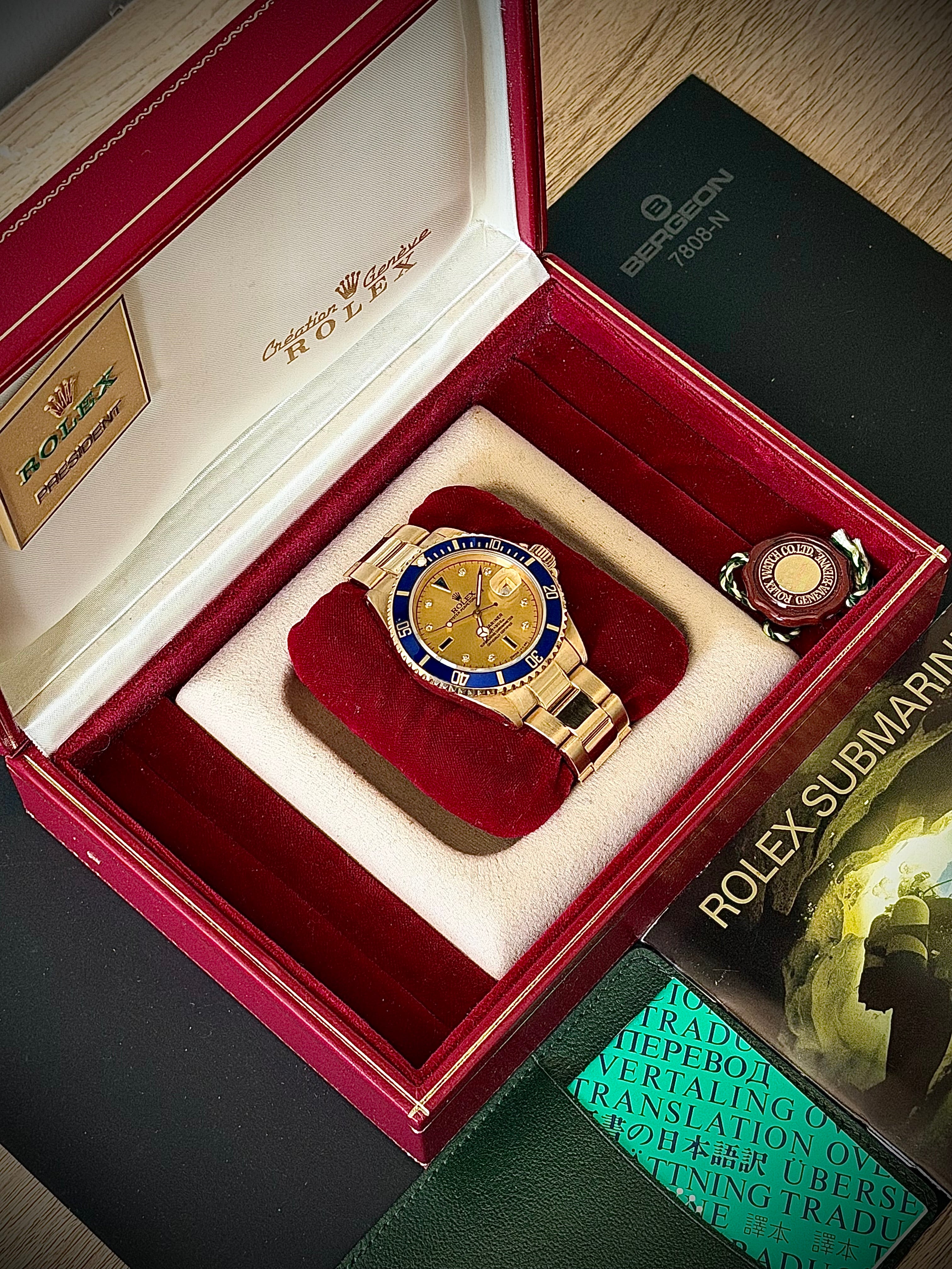 1988 ROLEX SUBMARINER, 16618, SULTAN DIAL, BOX AND BOOKLETS, INC GST