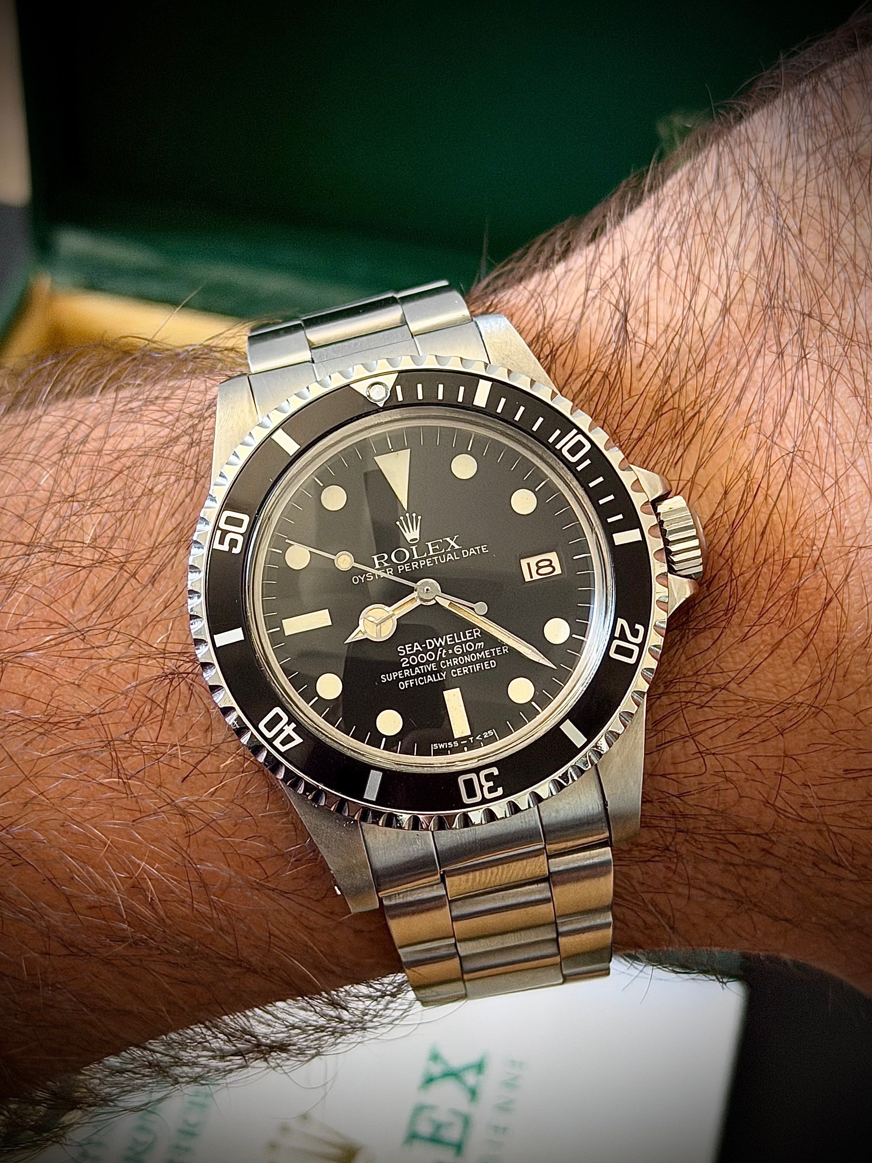 1981 ROLEX SEA-DWELLER 1665 “GREAT WHITE”, BOX AND PAPERS, INC GST