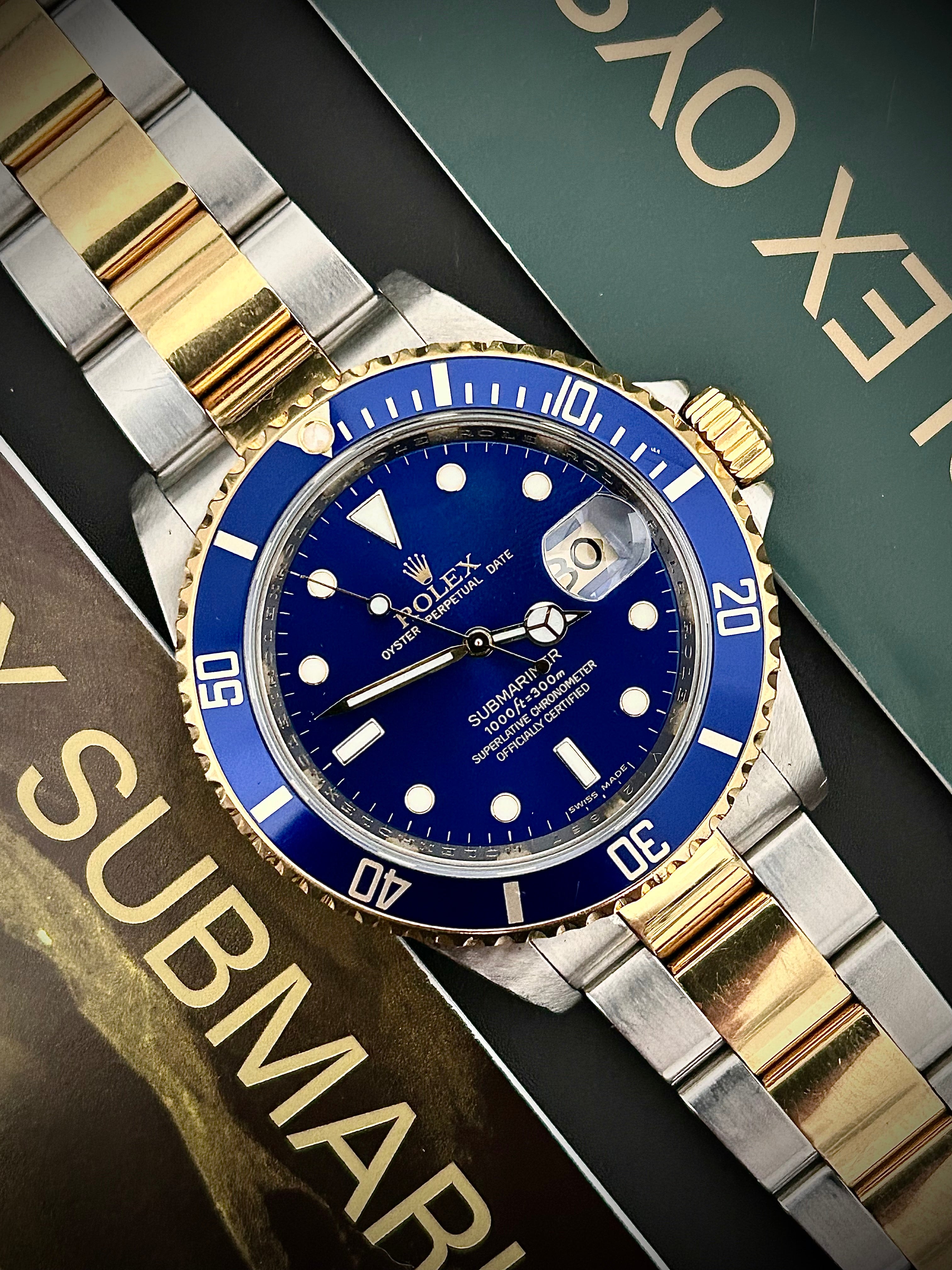 2008 ROLEX SUBMARINER DATE “BLUESY”, ENGRAVED REHAUT, NO HOLES, 16613LB, FULL SET, INC GST