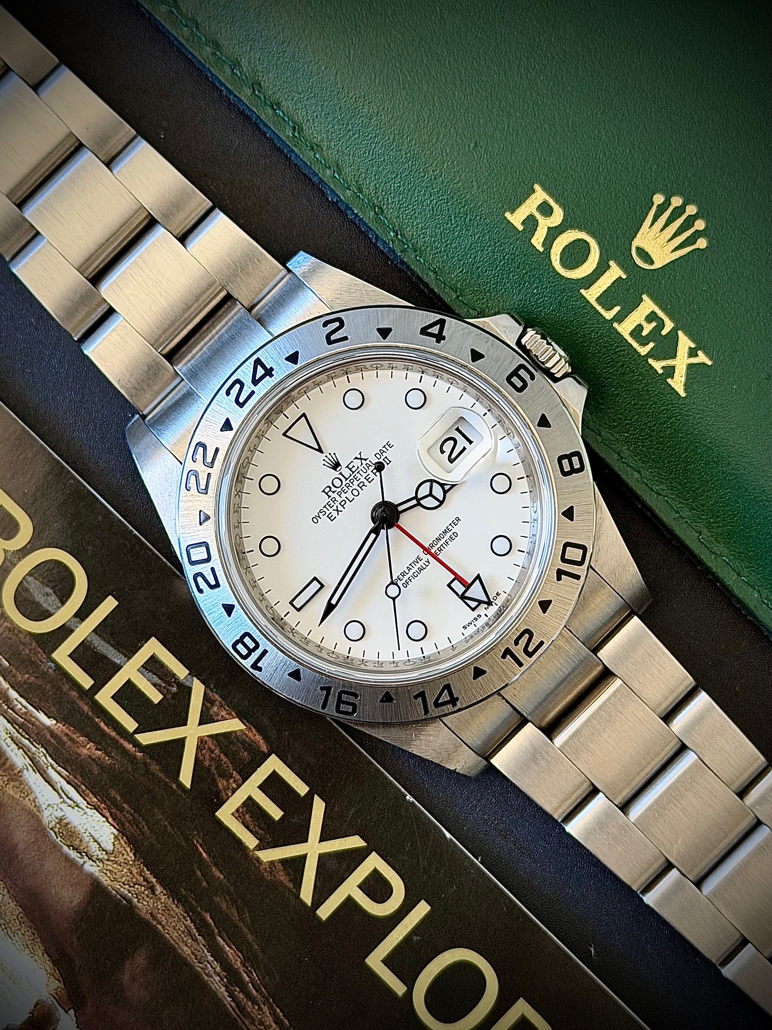 2011 ROLEX EXPLORER II, POLAR” 16570, NO HOLES SEL, ENGRAVED REHAUT, 3186 MOVEMENT, BOX BOOKLETS AND ORIGINAL RECEIPT, INC GST