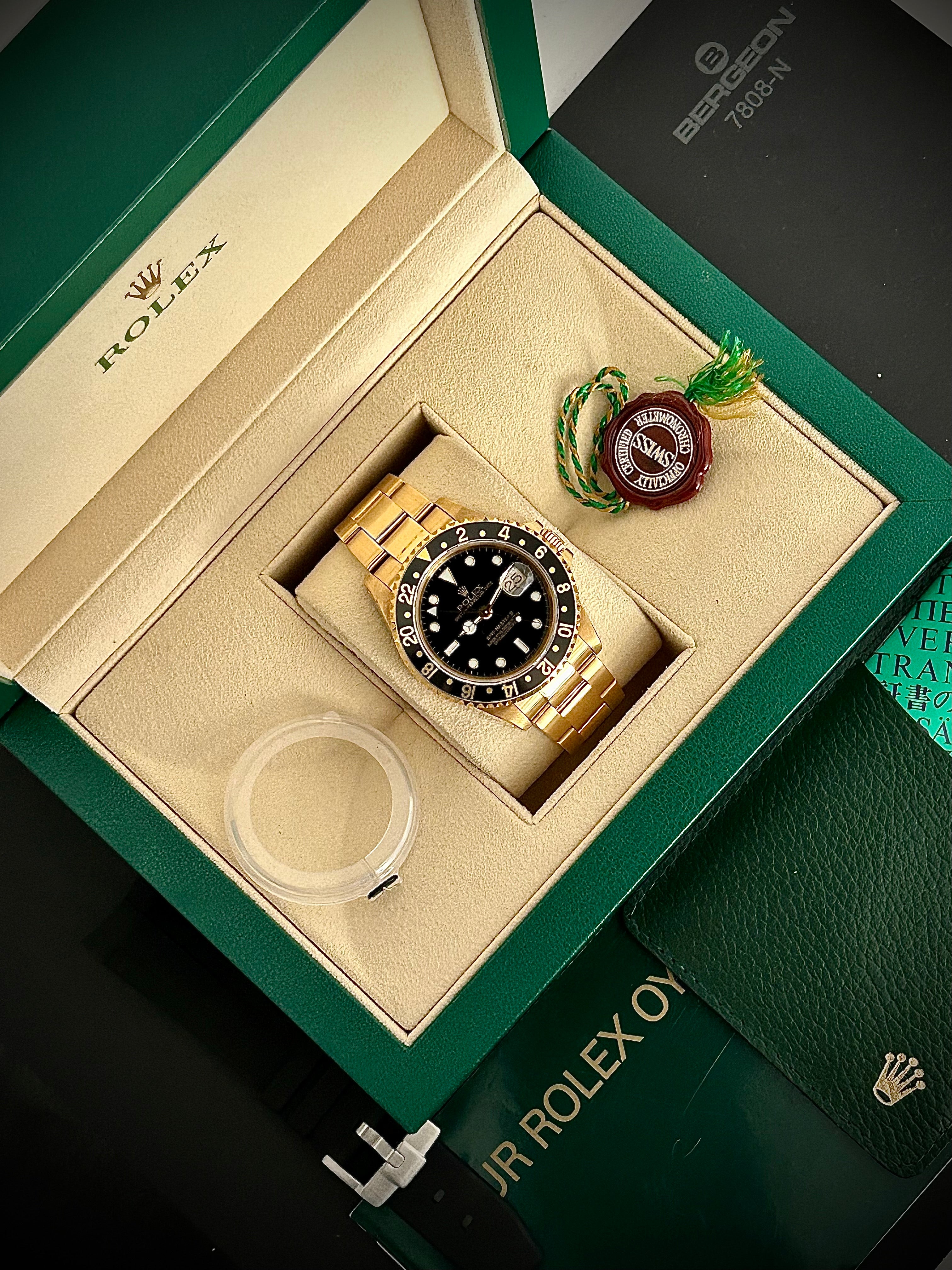 1994 ROLEX GMT MASTER II, SWISS ONLY, 16718, BOX AND BOOKLETS, INC GST