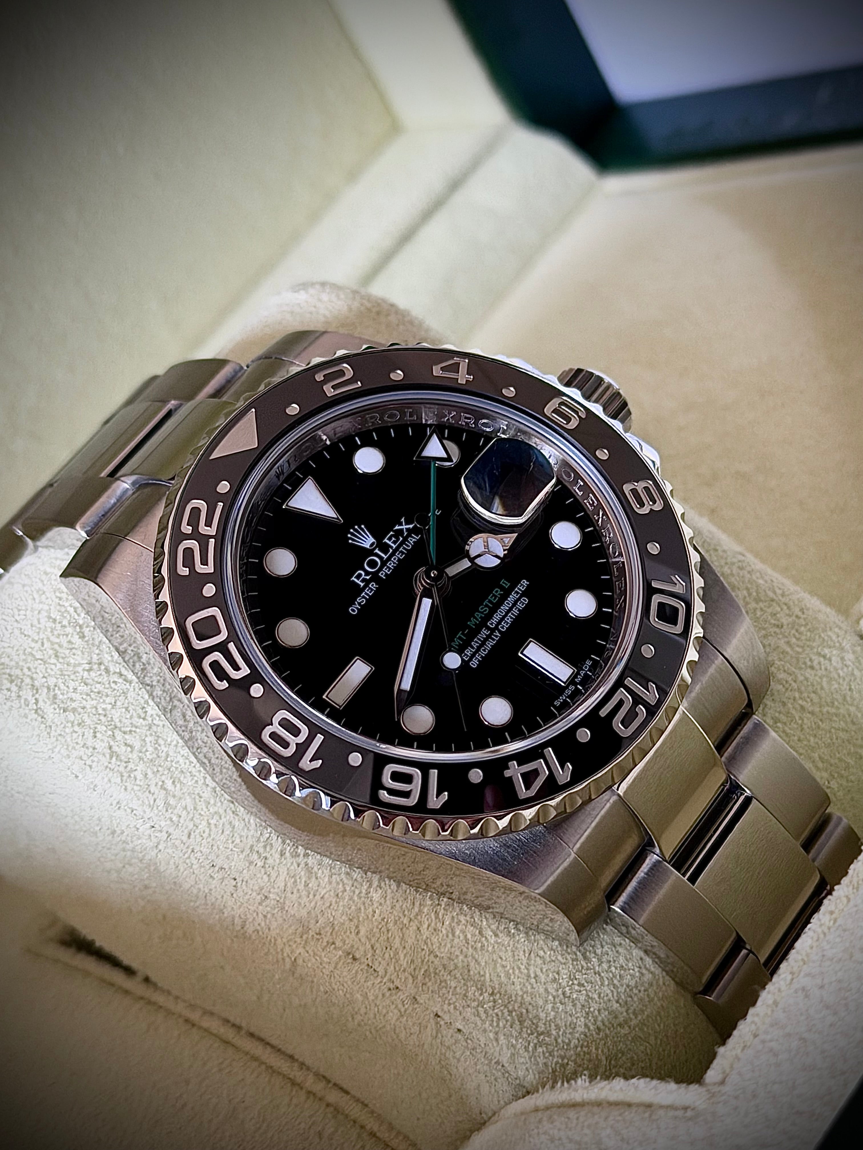 2010 ROLEX GMT MASTER II, 116710LN, BOX AND PAPERS, INC GST